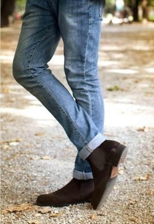 blue shirt with brown boots